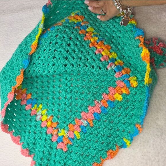 Poncho Handmade vibrant green crochet poncho adorned with pom-poms. - Picture 6 of 13